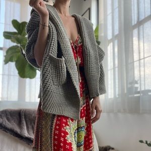 Convertible grey Woven sweater worn two ways